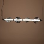 Lampa wisząca LED Elva 30W w kolorze czarnym i grafitowym, o nowoczesnym designie. Posiada sześć falistych elementów, które osłaniają źródło światła. Zawieszona na cienkim przewodzie, idealna do aranżacji wnętrz.