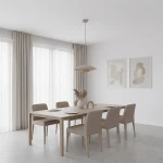 Lampa wisząca Babel w kolorze mokka z jednym źródłem światła GX53, zawieszona nad stołem w nowoczesnej jadalni. Otoczenie w jasnych tonach, z drewnianym stołem i beżowymi krzesłami. W tle okna z zasłonami oraz abstrakcyjne obrazy na ścianie.