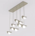 Lampa wisząca Ritual 9xG9 w kolorze mokka. Składa się z dziewięciu okrągłych źródeł światła umieszczonych na cienkich linkach, z dekoracyjnymi, półokrągłymi osłonami. Montaż sufitowy, nowoczesny design. Tło jasne.