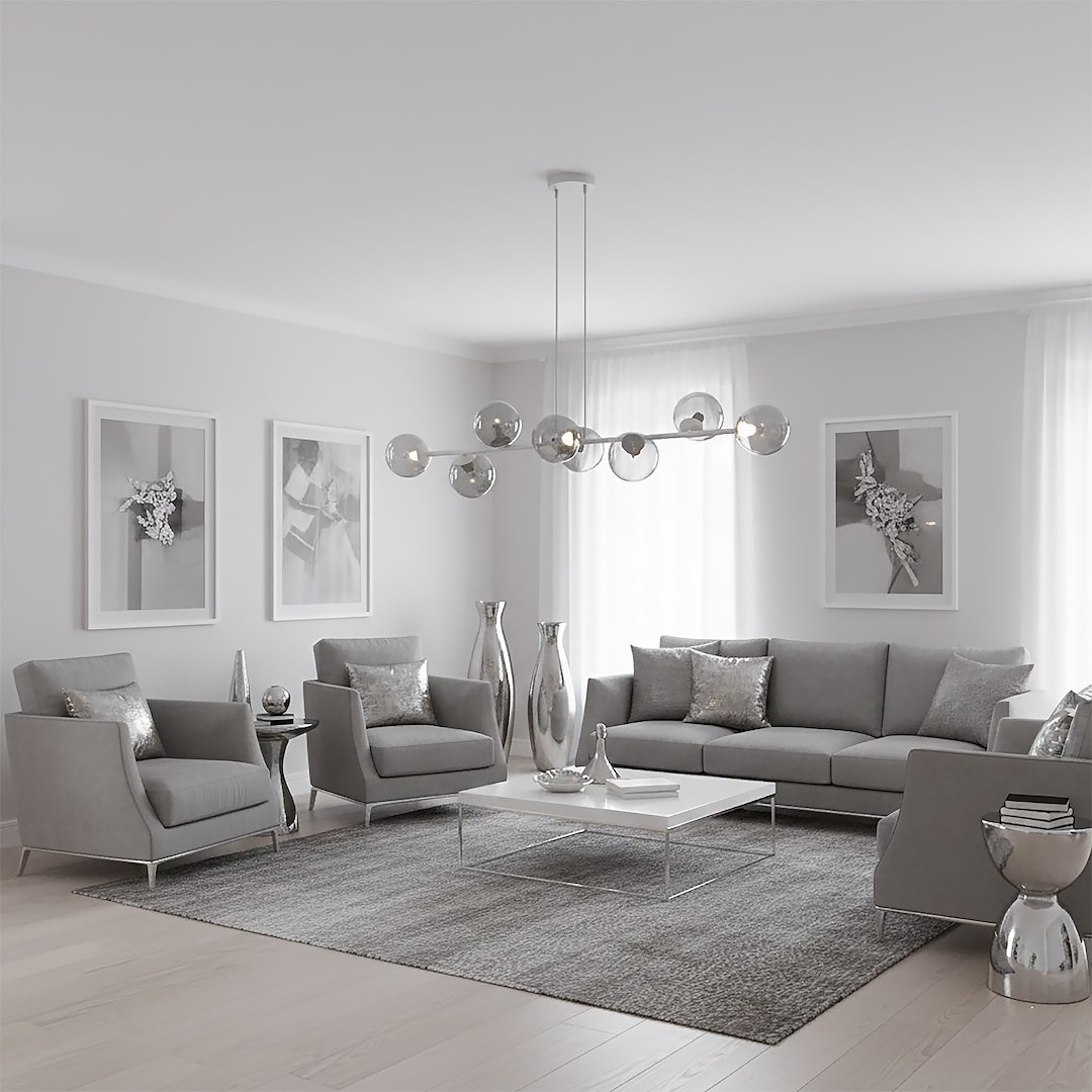 Lampa wisząca Magnus 8xE14 w kolorze szarym/grafitowym, z ośmioma szklanymi kloszami w formie kul, zawieszona na długim przewodzie. Umieszczona w nowoczesnym wnętrzu z szarymi meblami i dekoracjami, na tle jasnej ściany i okien.