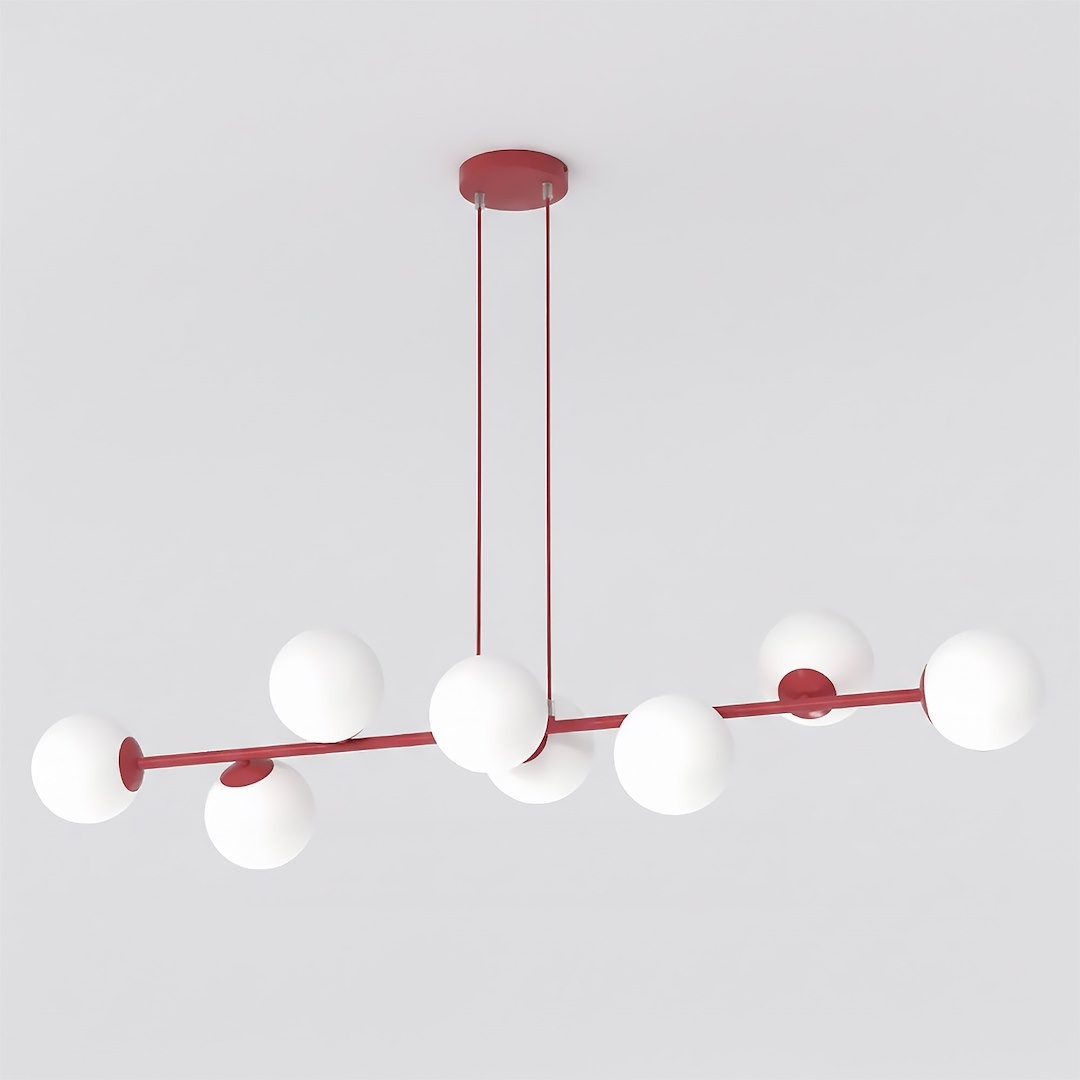 Lampa wisząca Magnus w kolorze burgundowym z białymi kulistymi kloszami. Posiada osiem punktów świetlnych na cienkim, metalowym stelażu, zawieszona na dwóch sznurkach, z okrągłym mocowaniem sufitowym.