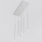 Lampa wisząca Selter w kolorze szarym z sześcioma cylindrycznymi źródłami światła G9. Umieszczona na prostokątnej, białej podstawie, zwisająca na cienkich linkach. Prosty, nowoczesny design, idealna do aranżacji wnętrz.