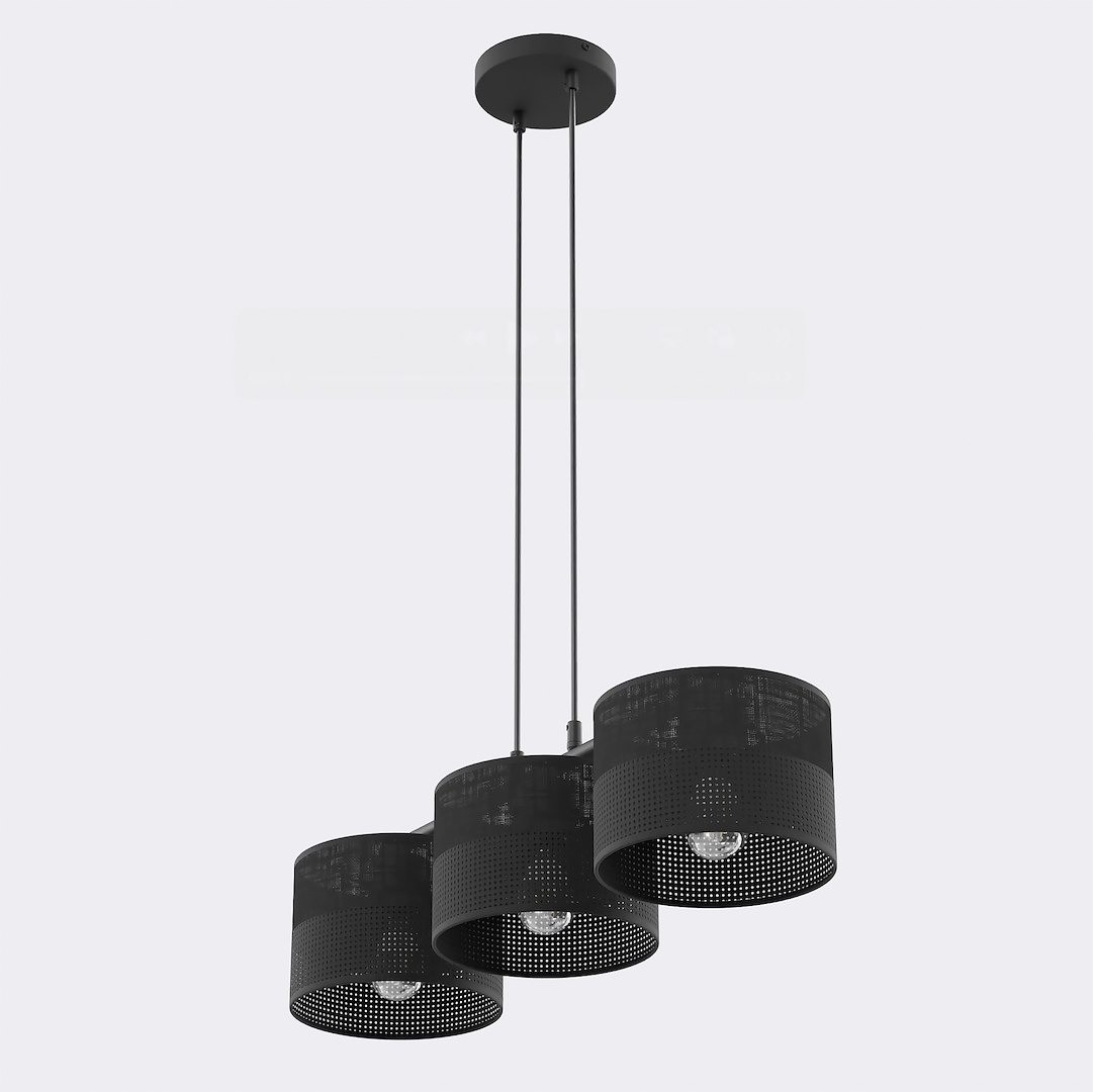 Lampa wisząca Karbon 3xE27 w kolorze czarnym z trzema cylindrycznymi kloszami o perforowanej fakturze. Ułożona w pionie, zawieszona na cienkich linkach, idealna do nowoczesnych wnętrz. Montowana na suficie, z widocznymi żarówkami.