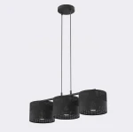 Lampa wisząca Karbon 3xE27 w kolorze czarnym. Składa się z trzech cylindrycznych kloszy z perforowanego materiału, zawieszonych na dwóch cienkich linkach. Całość montowana na okrągłej podsufitce.