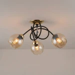 Modena Black lampa sufitowa 3-punktowa w kolorze czarnym i złotym, z trzema przezroczystymi kloszami w kształcie kul. Lampa ma czarne przewody i złoty uchwyt sufitowy, z dekoracyjnym kryształkiem na środku.
