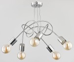 Lampa wisząca Tango 5-punktowa w kolorze chromu. Posiada pięć żarówek w przezroczystych oprawach, z elastycznymi, metalowymi ramionami, które tworzą dynamiczny układ. Montaż sufitowy, zdjęcie z góry.