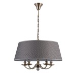 Lampa wisząca Zanobi PND-43272-5A z pięcioma punktami świetlnymi. Okrągły klosz w szaro-brązowym kolorze, teksturowany, z metalowymi elementami w kolorze złotym. Zawieszona na łańcuszku, z mocowaniem sufitowym.