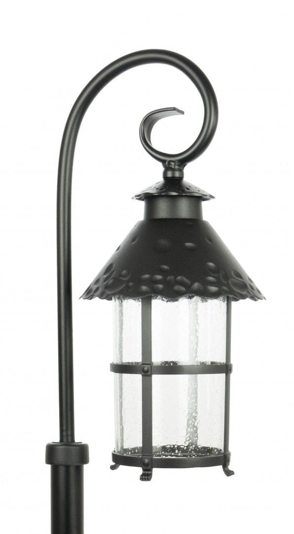 Czarna lampa stojąca ogrodowa Toledo H166 z metalowym, teksturowanym kloszem. Klosz z przezroczystego szkła, ozdobiony metalowymi ramkami. Lampa ma stylizowany uchwyt w kształcie spirali, umieszczona na prostym słupku.