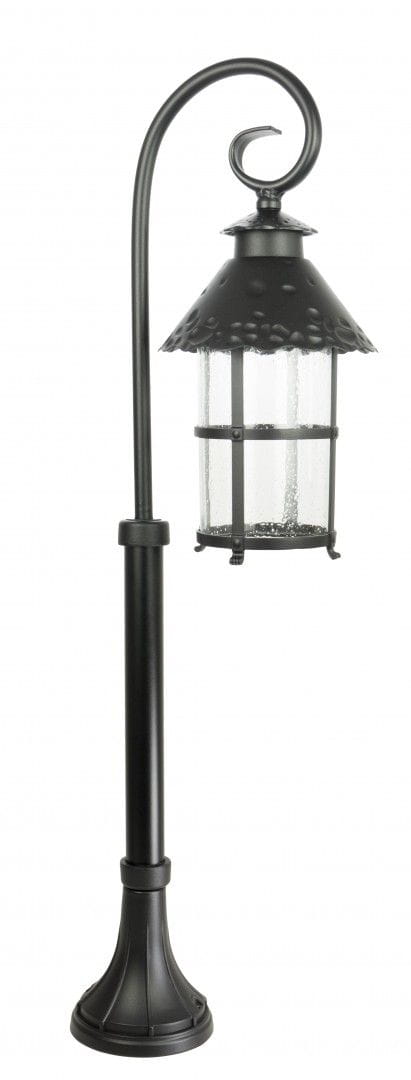 Czarna lampa stojąca ogrodowa Toledo H86 z jednym punktem świetlnym. Posiada szklany klosz z widoczną fakturą, metalową podstawę i ozdobny, zakrzywiony uchwyt. Całość ma elegancki, klasyczny wygląd, idealna do użytku na zewnątrz.