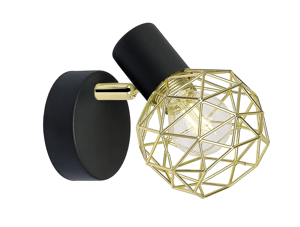 Kinkiet Acrobat 1-punktowy, z metalowym kloszem w złotym kolorze w geometrycznym wzorze, zamocowany na czarnej podstawie. Ujęcie z boku, pokazujące detal konstrukcji i źródło światła. Idealny do nowoczesnych wnętrz.