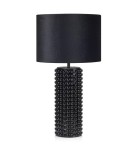 Czarna lampa stołowa Proud z 1 punktem świetlnym. Okrągły, teksturowany korpus z wypukłymi kulkami, zakończony cylindrycznym kloszem z matowego materiału. Ujęcie frontalne, stojąca na płaskiej powierzchni.