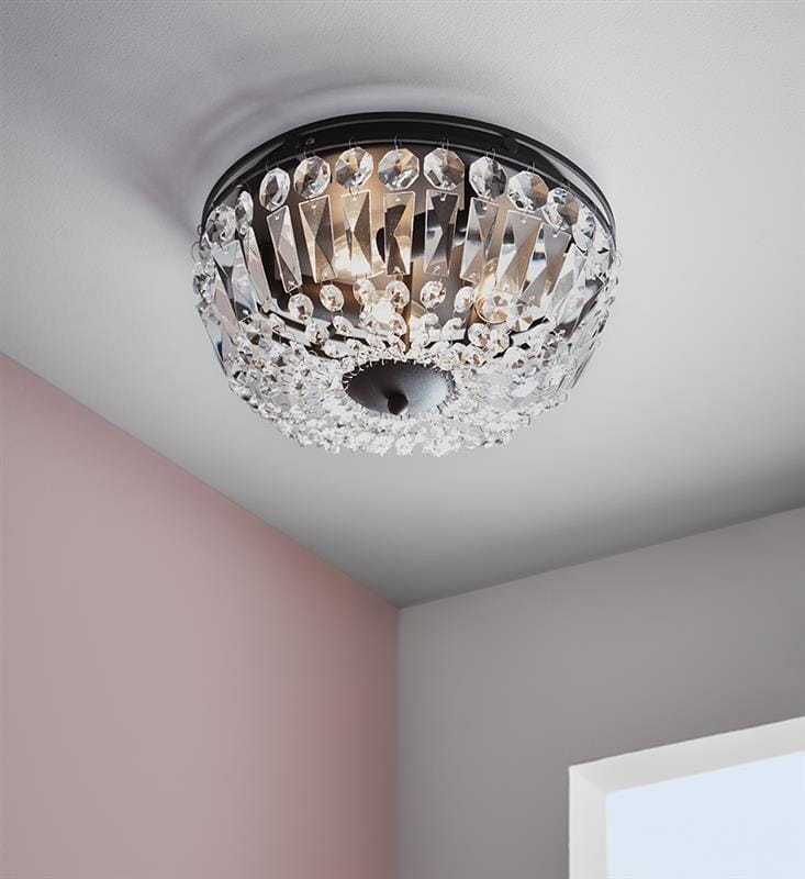 Czarna lampa sufitowa 3-punktowa Vasa z kryształowymi detalami. Okrągła konstrukcja z przezroczystymi, błyszczącymi elementami odbijającymi światło, zamontowana na suficie. Widoczny czarny mocownik w centralnej części.