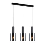 Lampa wisząca Sardo 3-punktowa w kolorze czarnym z dymionymi kloszami. Składa się z trzech cylindrycznych lamp o metalicznych wykończeniach, zawieszonych na czarnym stelażu. Ujęcie frontalne, wszystkie elementy widoczne w jednorodnym tle.