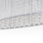 Lampa wisząca Anabella 6-punktowa, z przezroczystymi kryształkami, metalową konstrukcją w srebrnym kolorze. Widoczna górna część z długimi, szklanymi elementami oraz dekoracyjnymi, wiszącymi kryształami. Ujęcie zbliżeniowe na detale.