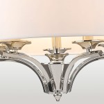 Lampa wisząca Atlanta 5-punktowa w wykończeniu chromowanym. Klosze w jasnym kolorze, elegancka konstrukcja z wyraźnymi detalami. Ujęcie z bliska, pokazujące mocowanie i elementy dekoracyjne.