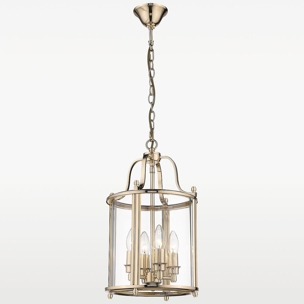 Złota lampa wisząca New York 4-punktowa z przezroczystym kloszem, prezentująca elegancki, cylindryczny kształt. Zawieszona na łańcuchu, z widocznymi czterema źródłami światła oraz dekoracyjnymi detalami w metalicznym wykończeniu.