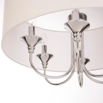 Lampa wisząca Abu Dhabi 6-punktowa, chromowana, z eleganckimi, zaokrąglonymi kloszami. Ujęcie z bliska, ukazujące detale metalowych ramion i żarówek. Tło jasne, minimalistyczne.