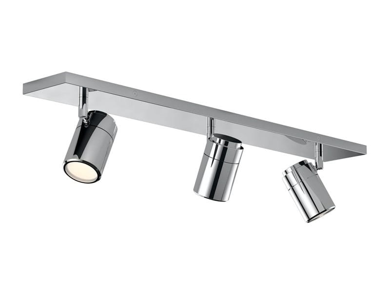 Lampa sufitowa Noemie IP44, 3-punktowa, w chromowanym wykończeniu. Składa się z trzech obrotowych reflektorów zamocowanych na prostokątnej podstawie. Reflektory mają cylindryczny kształt i są skierowane w różnych kierunkach.