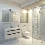 Czarny kinkiet Shine LED IP44, 1-punktowy, długość 40 cm, moc 7W, zamontowany nad lustrem w nowoczesnej łazience. Oświetlenie w minimalistycznym stylu, idealne do strefy mokrej. Ściana w jasnych odcieniach, szklana kabina prysznicowa w tle.