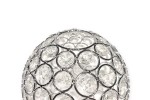Klosz szklany w kształcie kuli o średnicy 140 mm, wykonany z transparentnego szkła i chromowanego metalu. Wzór składa się z okrągłych kryształowych elementów, tworzących dekoracyjny efekt świetlny. Ujęcie z góry, ukazujące detale konstrukcji.