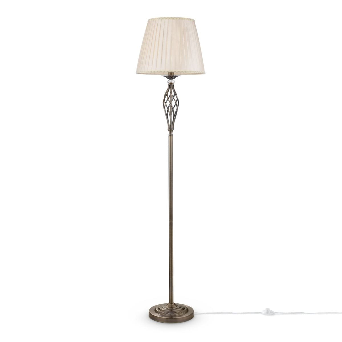 Lampa podłogowa Grace w kolorze patynowym, z okrągłą podstawą i smukłym, dekoracyjnym trzonem. Górna część z plisowanym kloszem w odcieniu jasnego beżu, stojąca na białym tle. Kabel z włącznikiem widoczny obok.