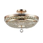 Lampa sufitowa Ottilia 6-punktowa z kryształowymi dekoracjami w kolorze przezroczystym. Okrągła, metalowa podsufitka w kolorze złotym. Widoczny wiszący kryształ w centralnej części. Stylowa, elegancka konstrukcja idealna do nowoczesnych wnętrz.