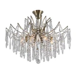 Żyrandol Mallola 8-punktowy PND-56808-8 z chromowanym mocowaniem, ozdobiony kryształowymi zwisami w kształcie kropli. Ujęcie z dołu, ukazujące elegancki design oraz cztery źródła światła, tworzące efektowną iluminację. Tło białe.