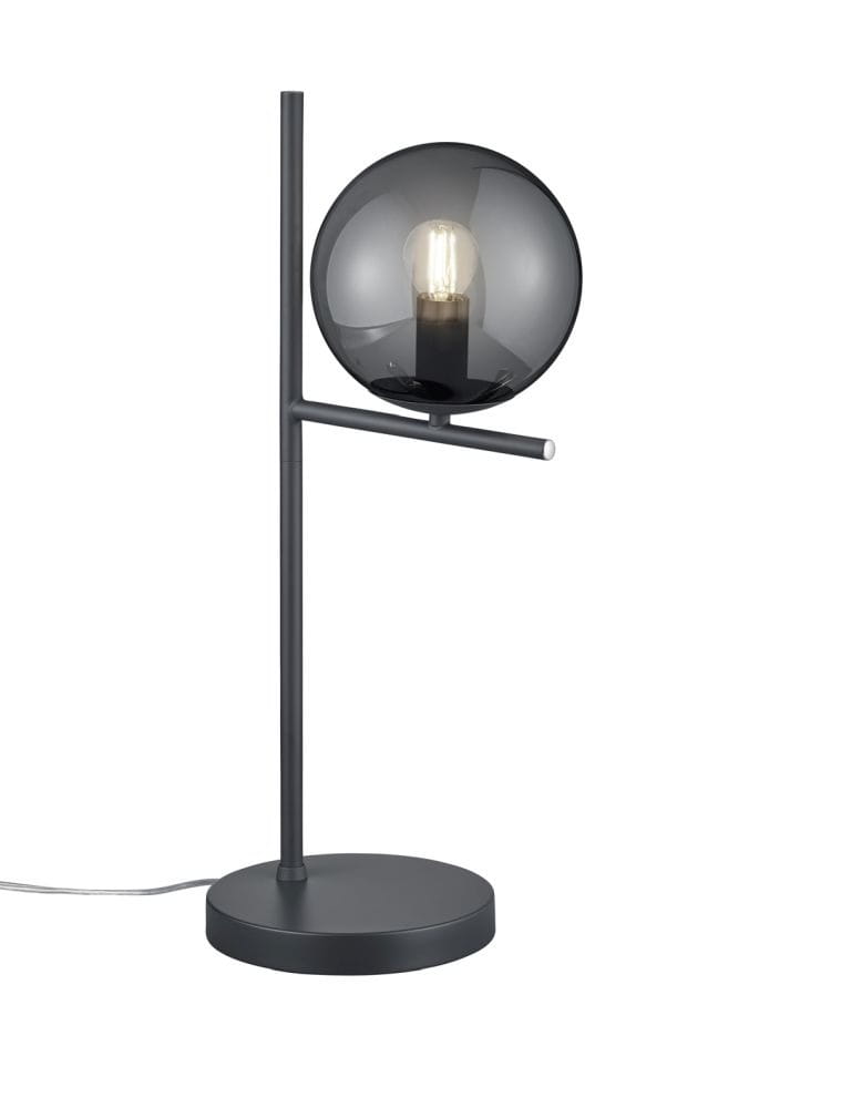Lampa stołowa Pure 1-punktowa w kolorze antracytowym, z okrągłym kloszem w odcieniu szaro-przezroczystym. Stojąca na okrągłej podstawie, z cienką, prostą nogą oraz poprzeczką. Widoczna żarówka wewnątrz klosza.