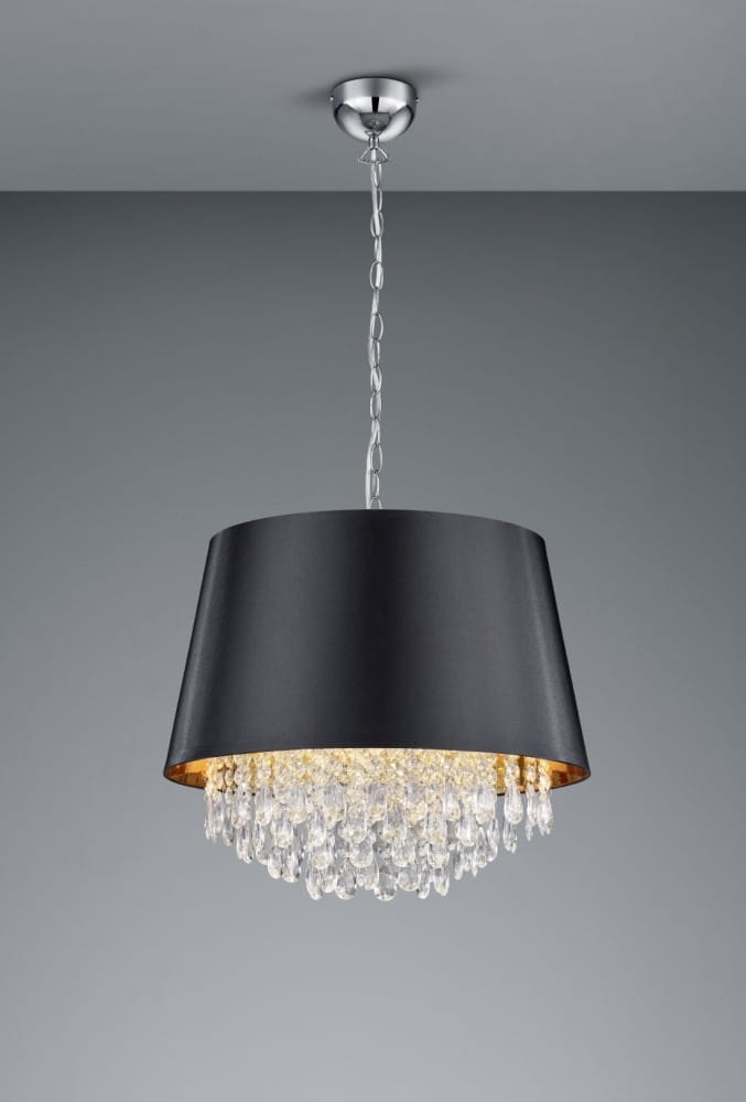 Lampa wisząca Loreley 3-punktowa w kolorze czarnym z metalowym kloszem i kryształowymi dekoracjami. Zawieszona na przezroczystym przewodzie, z podwójnym wykończeniem: matowym na zewnątrz i złotym wewnątrz. Ujęcie frontalne.