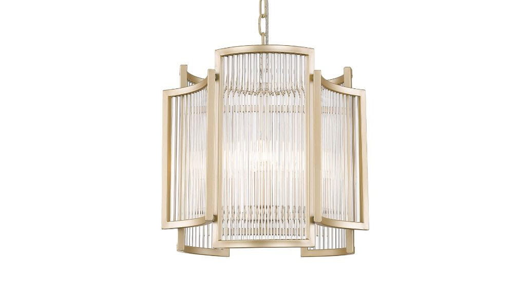 Złota lampa wisząca Sergio z trzema punktami świetlnymi, o cylindrycznym kształcie, z przezroczystymi elementami i dekoracyjnymi szczelinami, zawieszona na łańcuchu, prezentująca elegancki styl.