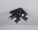 Czarna lampa sufitowa Marley z czterema punktami świetlnymi, zainstalowana na prostokątnej podstawie. Każdy z reflektorów ma cylindryczny kształt, skierowany w różnych kierunkach, co umożliwia regulację oświetlenia.