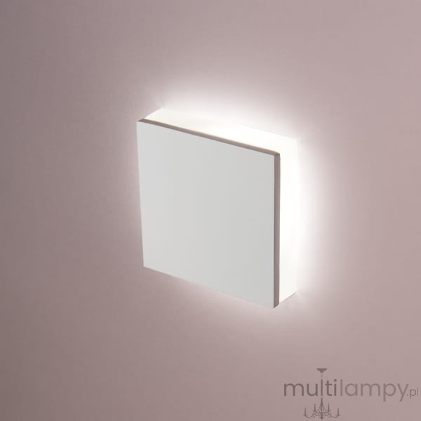 Prostokątna oprawa schodowa Lesel LED 008A L w kolorze białym, montowana na ścianie, z delikatnym podświetleniem. Wykończenie z matowego materiału, minimalistyczny design, idealna do oświetlenia schodów lub korytarzy.