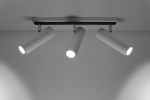 Trzypunktowa lampa sufitowa Direzione w kolorze białym, z cylindrycznymi kloszami skierowanymi w dół. Ułożona równolegle do sufitu, na prostokątnej podstawie. Klosze mają gładką fakturę i emitują jasne światło.