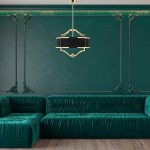 Lampa wisząca Stesso Gold Nero M w kolorze złotym i czarnym, o czterech punktach świetlnych, zawieszona w nowoczesnym wnętrzu. W tle ciemnozielona ściana oraz stylowa, miękka kanapa w odcieniu butelkowej zieleni.