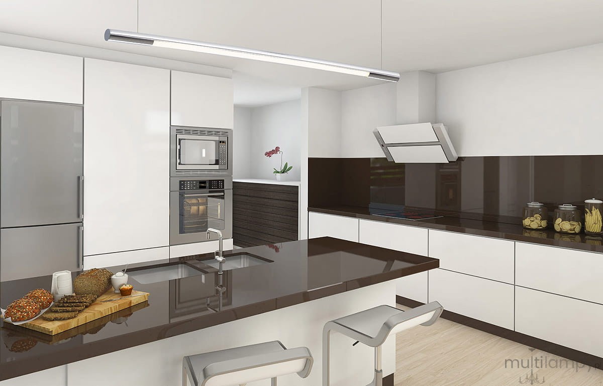 Lampa wisząca Organic LED D100 w kolorze chromu, jednolita konstrukcja, umieszczona nad ciemnym blatem kuchennym. Widoczna w nowoczesnej kuchni z białymi szafkami i sprzętem AGD. Ujęcie frontalne, lampa zawieszona na suficie.