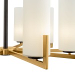 Lampa wisząca Fortano MOD089PL-10BS z dziesięcioma punktami świetlnymi. Metalowa podstawa w kolorze złotym z matowymi, białymi kloszami w kształcie cylindrów. Ujęcie z bliska, ukazujące detale konstrukcji i połączenia.