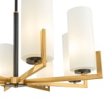 Lampa wisząca Fortano MOD089PL-08BS z 8 punktami świetlnymi. Konstrukcja w kolorze złotym z czarnymi akcentami, z okrągłymi, mlecznymi kloszami. Ujęcie z boku, pokazujące szczegóły mocowania oraz wykończenia.