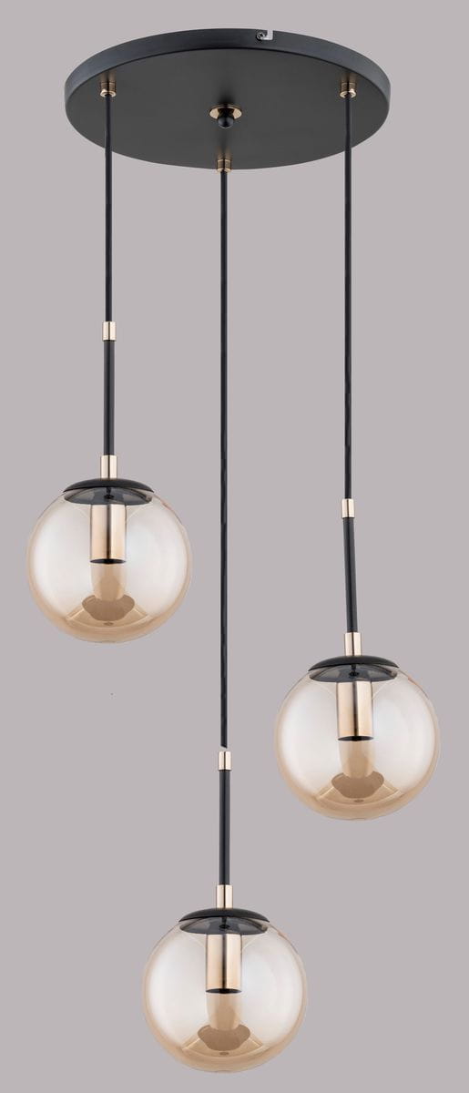 Lampa wisząca Sebia 3-punktowa 61083 z trzema szklanymi kloszami w kształcie kul, w odcieniu brązowym, zawieszona na czarnych linkach. Metalowa podsufitka w kolorze czarnym z mosiężnymi detalami. Klosze umieszczone w różnej wysokości.