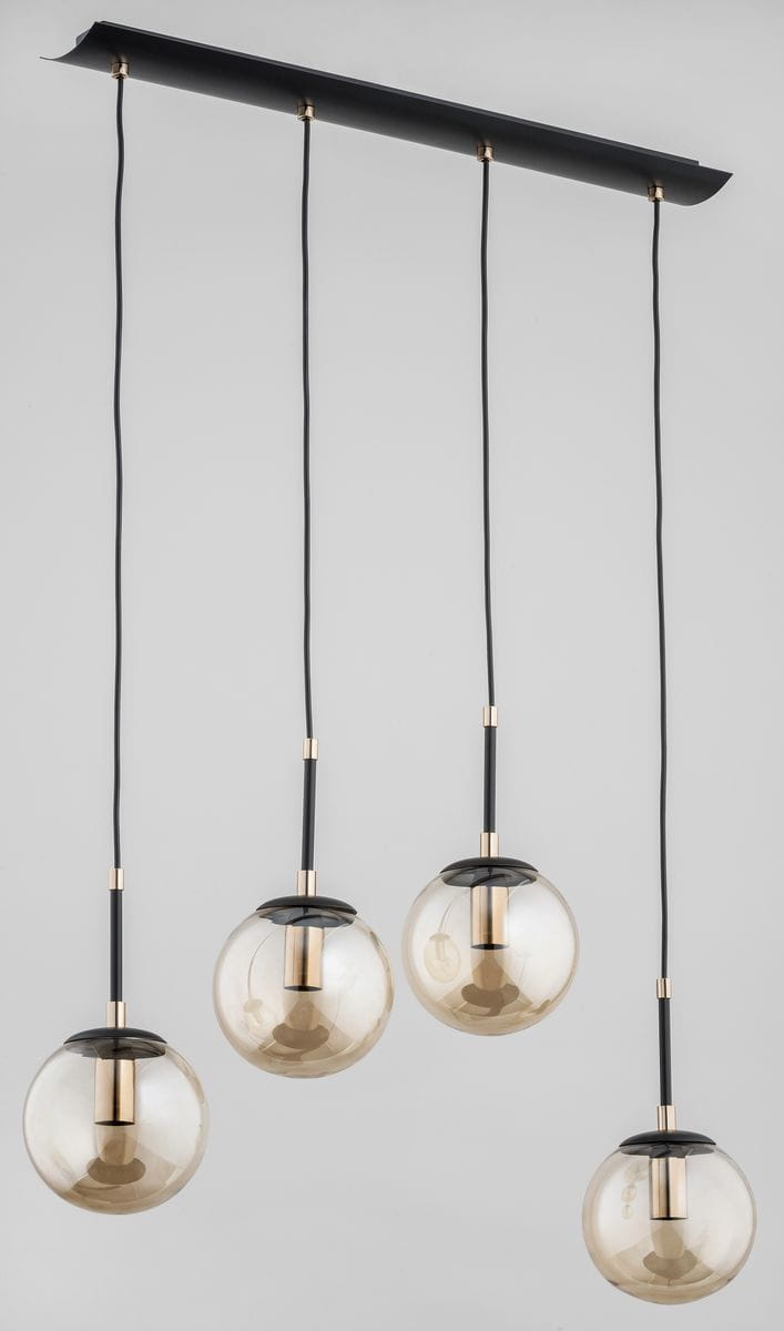 Lampa wisząca Sebia 4-punktowa 61064 z czterema szklanymi kloszami w odcieniach brązu, zawieszona na czarnych przewodach. Klosze mają okrągły kształt i metalowe elementy w kolorze złotym. Ujęcie frontalne, na jednolitym tle.