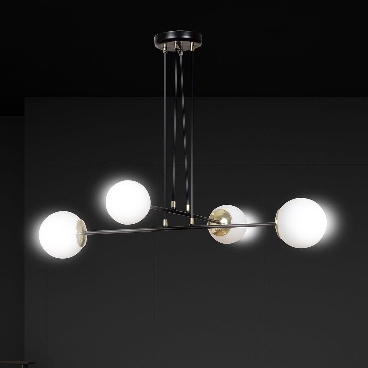 Lampa wisząca Ognis 4-punktowa w kolorze czarnym. Posiada cztery okrągłe, białe klosze umieszczone na metalowych ramionach z wykończeniem w kolorze złotym. Zawieszona na cienkich linkach, montowana do sufitu, idealna do nowoczesnych wnętrz.