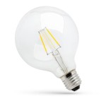 Żarówka LED Globe G125 w kształcie kuli, kolor przezroczysty. Posiada gwint E27, moc 8W i temperaturę barwową 2700K (ciepła biała). Widoczne elementy filamentowe wewnątrz żarówki. Stoi na płaskiej powierzchni, lekko przechylona.