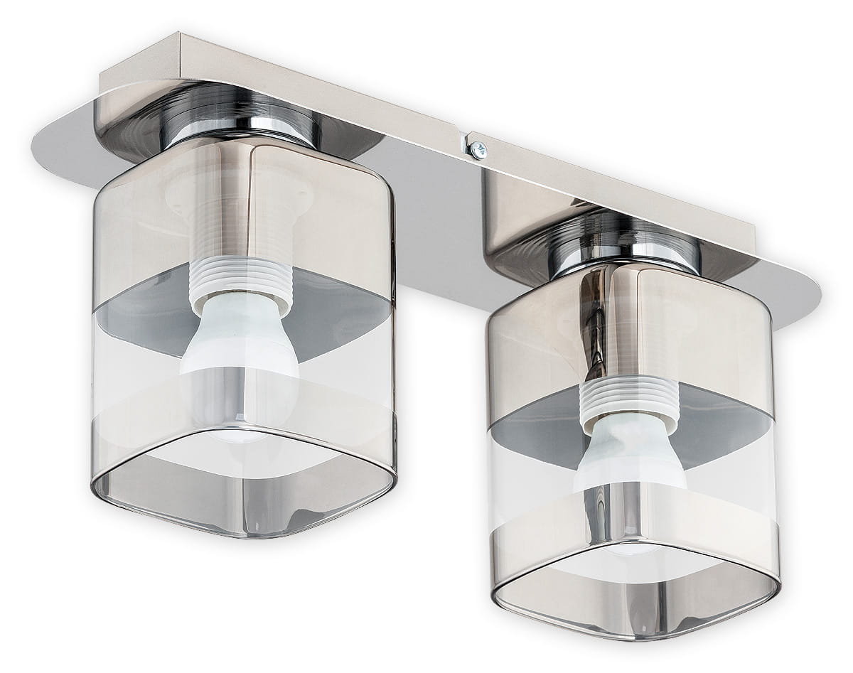 Lampa sufitowa Chroms O2612 P2 CH z dwoma punktami świetlnymi, metalowa w kolorze chromu, z przezroczystymi kloszami o kształcie heksagonalnym. Ujęcie z przodu, zamontowana pod sufitem, widoczne gwinty żarówek.